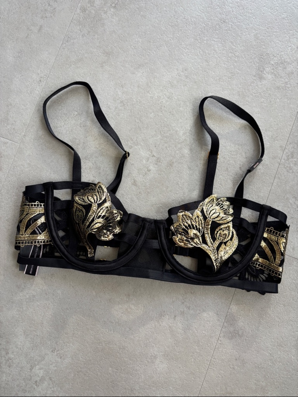 VS black and gold bra.